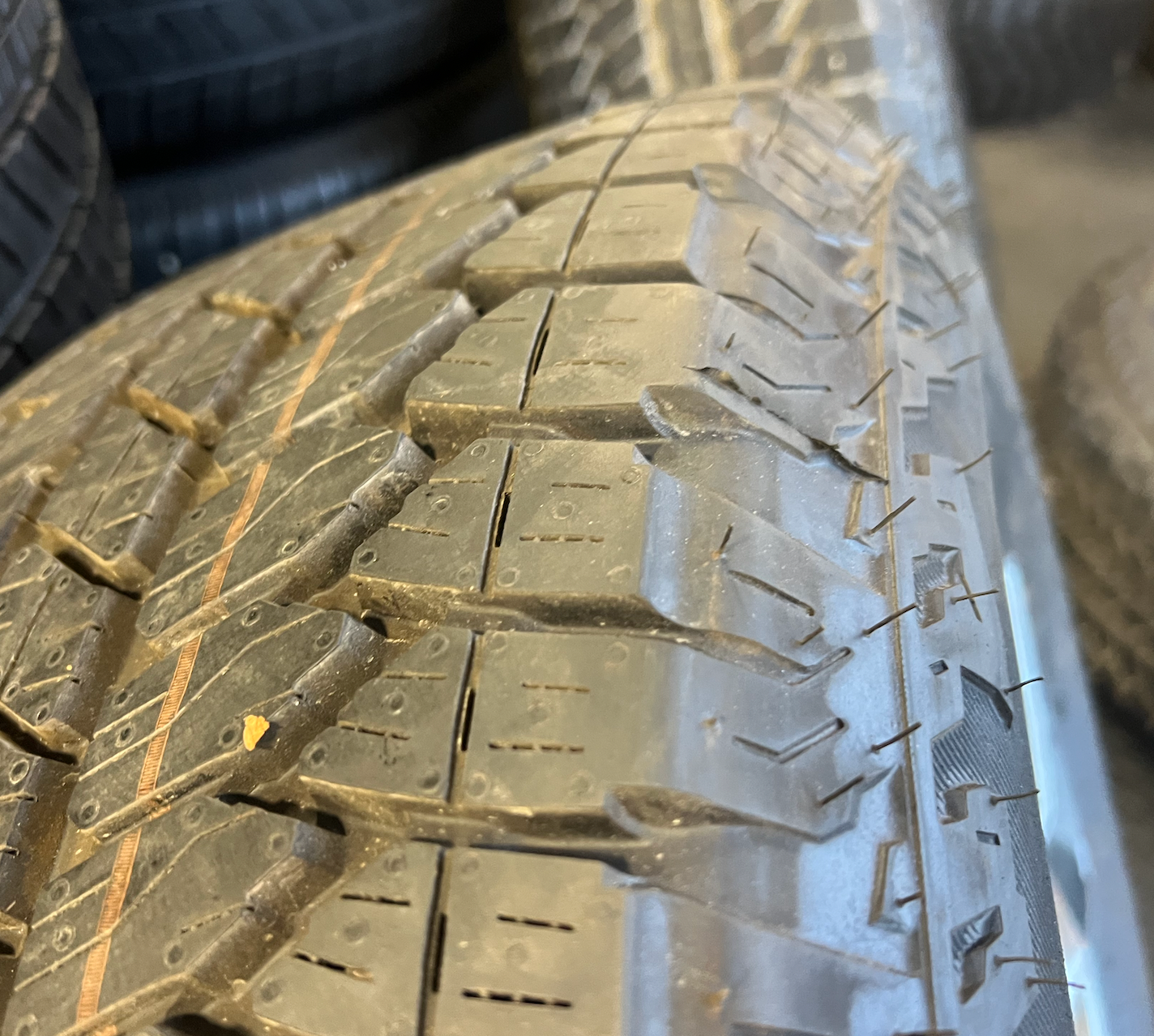 OEM 20” Gunmetal & Machined RST Wheels wrapped in Bridgestone Dueler A/T tires.