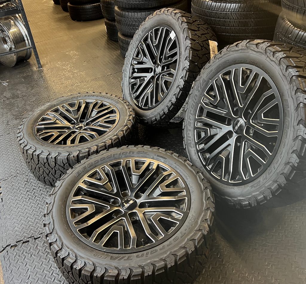OEM 22”  Wheels wrapped in BFGoodrich All-Terrain T/A tires.