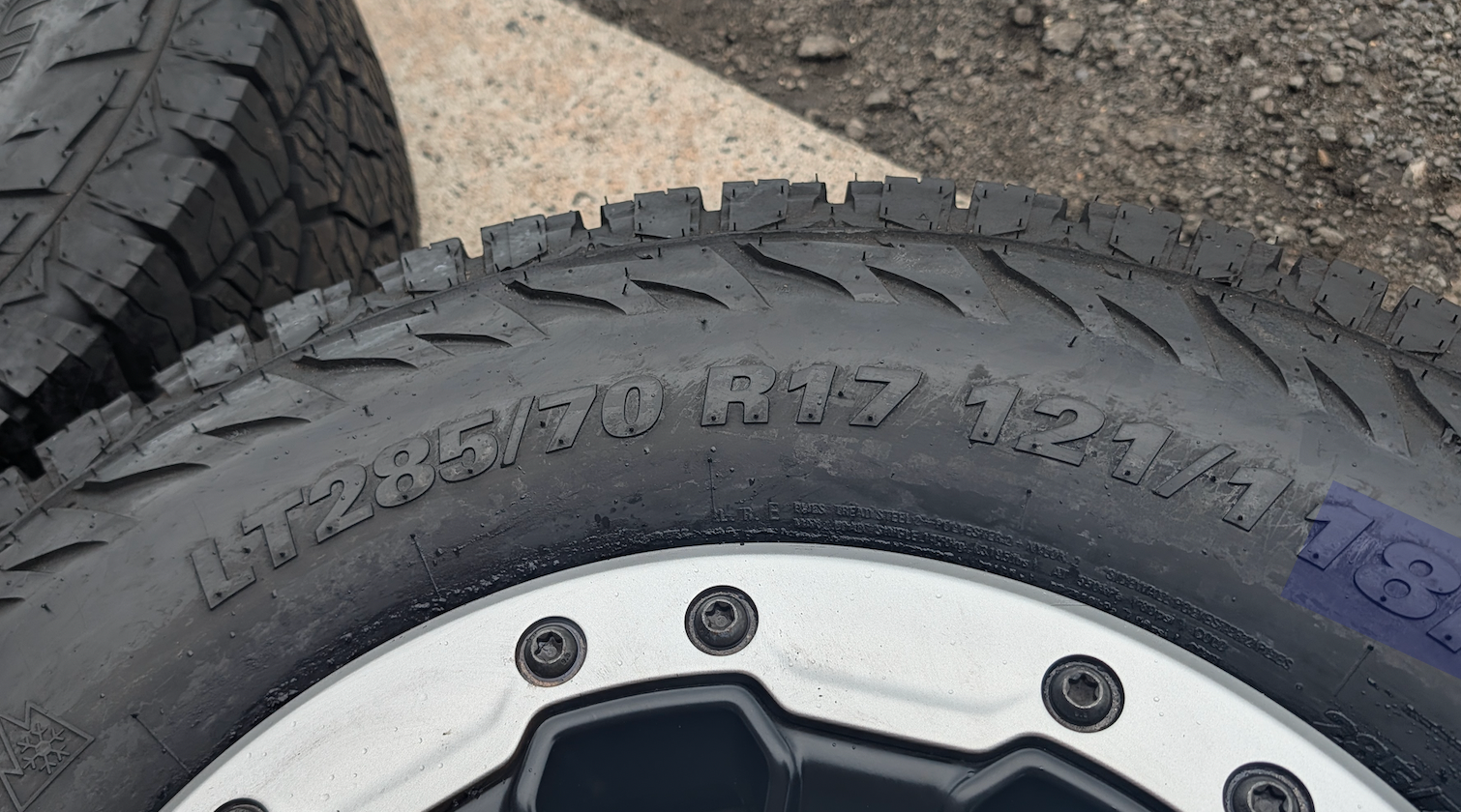 Machined Ram 2500 / 3500 Power Wagon OEM 17” Wrapped in Kumho Road Venture AT52 LT285/70R17