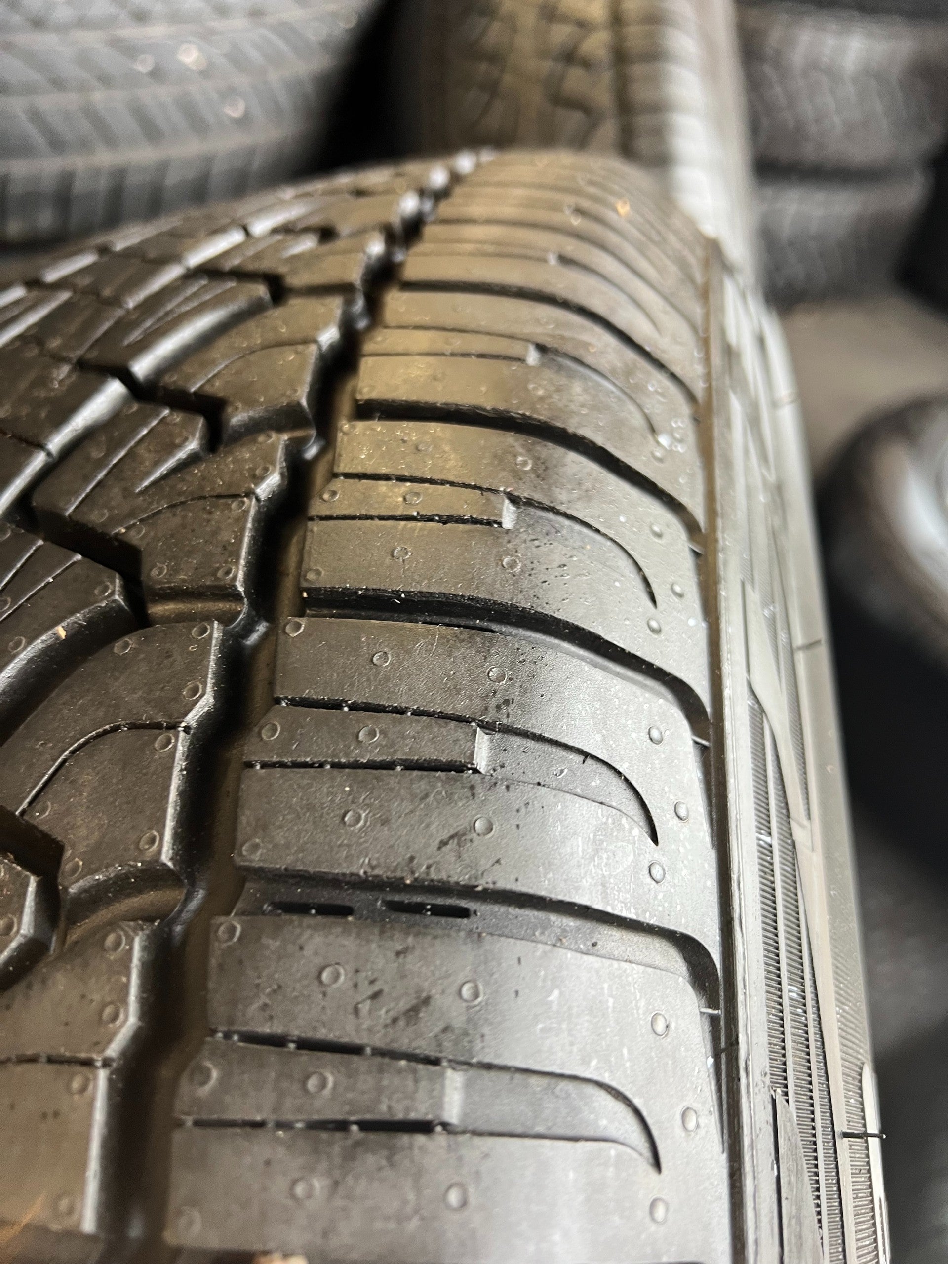 OEM 20” Gloss Black Wheels with Silver Inserts / Accents wrapped in 275/60R20 Pirelli Scorpion A/T tires.