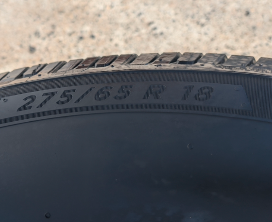 Gray Machined Ford F-150 Lariat OEM 18” Wrapped in Michelin Defender LTX 275/65R18