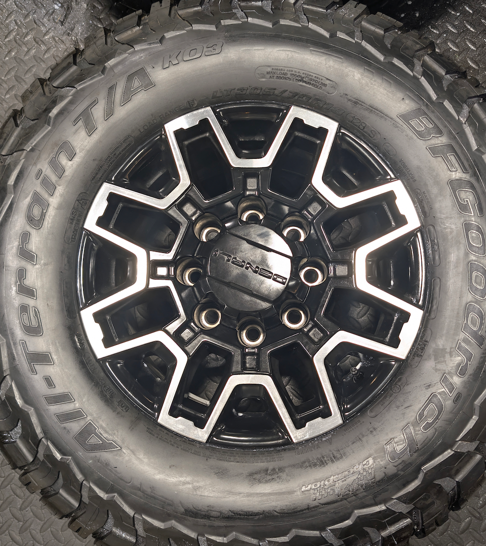 Machined Black GM 2500HD / 3500HD OEM 18” Wrapped in BFGoodrich All-Terrain T/A KO3 LT305/70R18