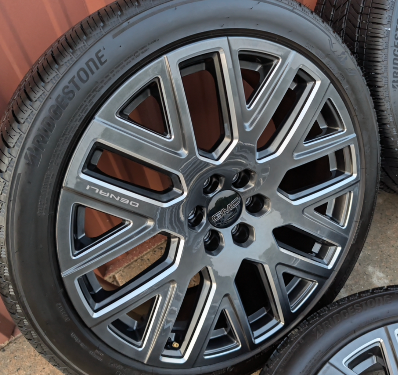 Machined GMC Yukon Denali Ultimate OEM 24” Wrapped in Bridgestone Alenza A/S 02 285/40R24