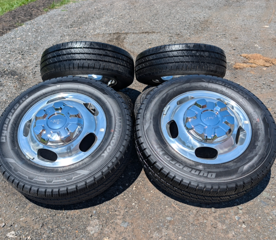 OEM 16” Polished Ford Transit Dual Rear Wheel (Dually) Wheels wrapped in 205/75R16 Hankook Dynapro HT tires.
