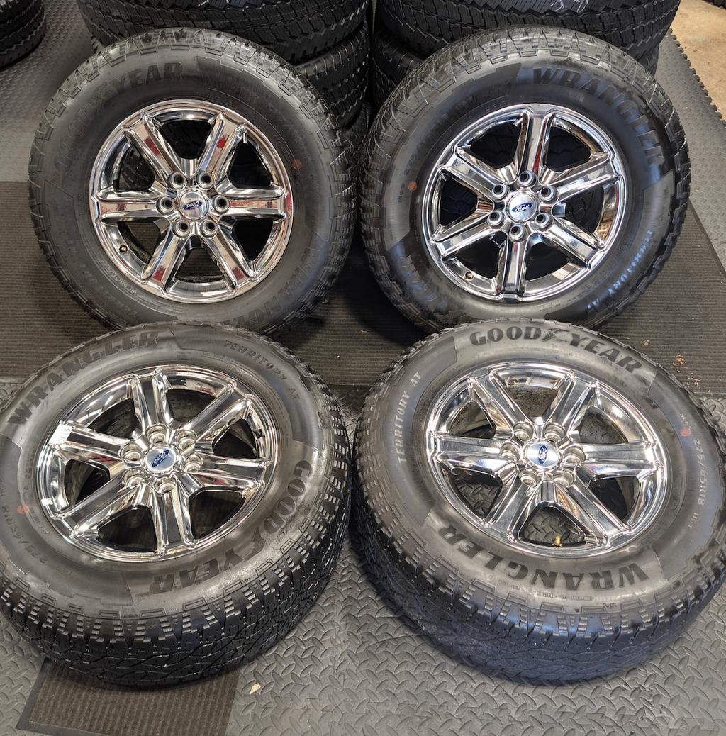 Chrome Ford F-150 OEM 18” Wrapped in Goodyear Wrangler Territory A/T 275/65R18
