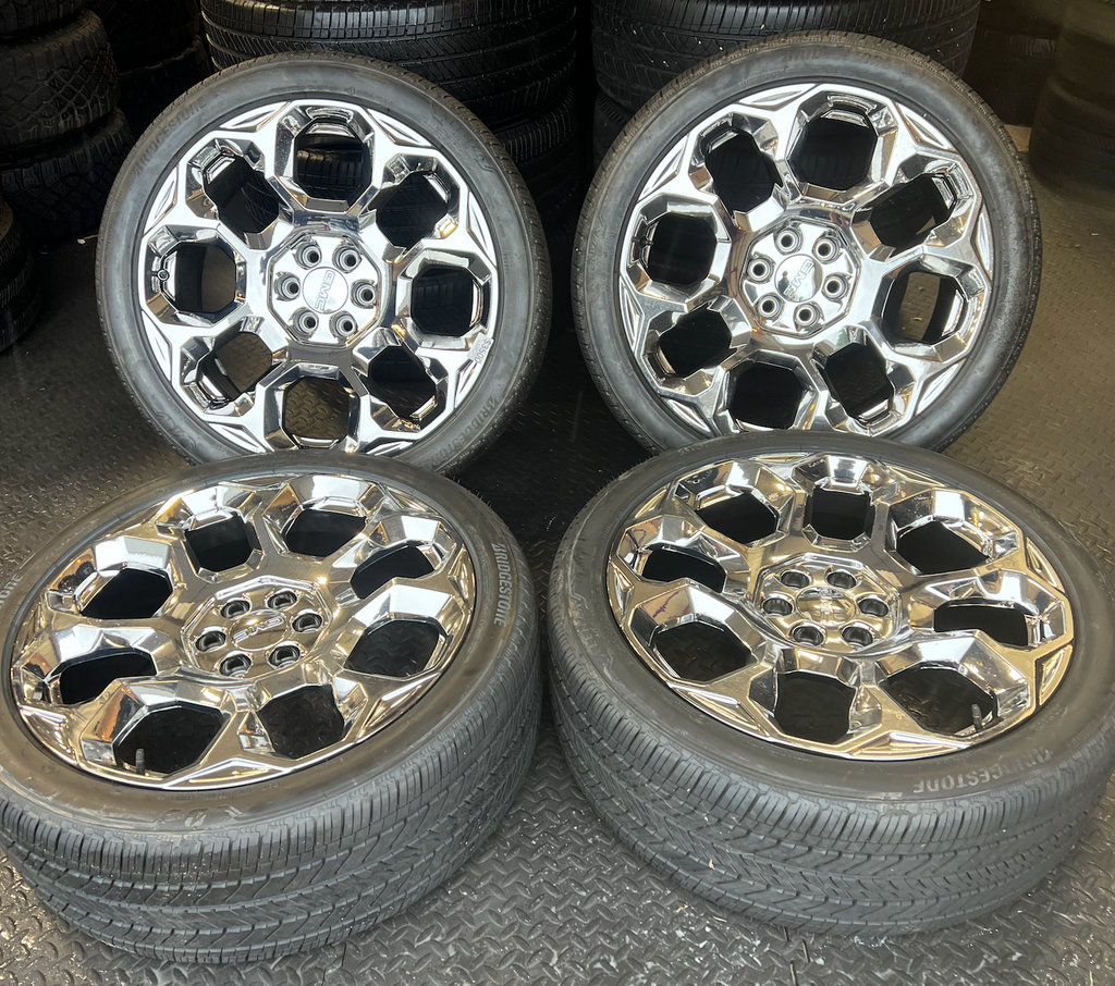 Chrome GMC Yukon Denali OEM 24” Wrapped in Bridgestone Alenza 285/40R24