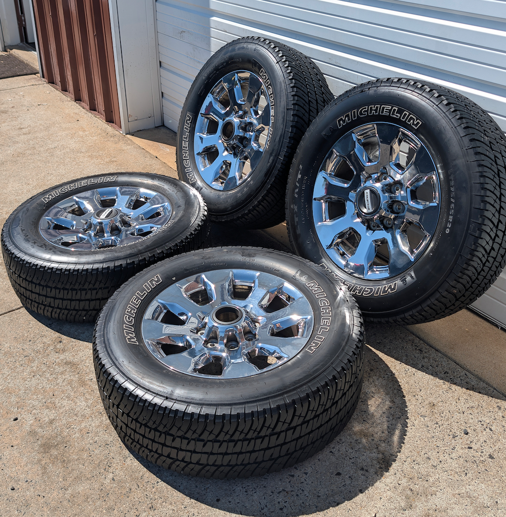 OEM 20” Chrome Ford F-250 King Ranch Wheels wrapped in Michelin LTX A/T2 tires.