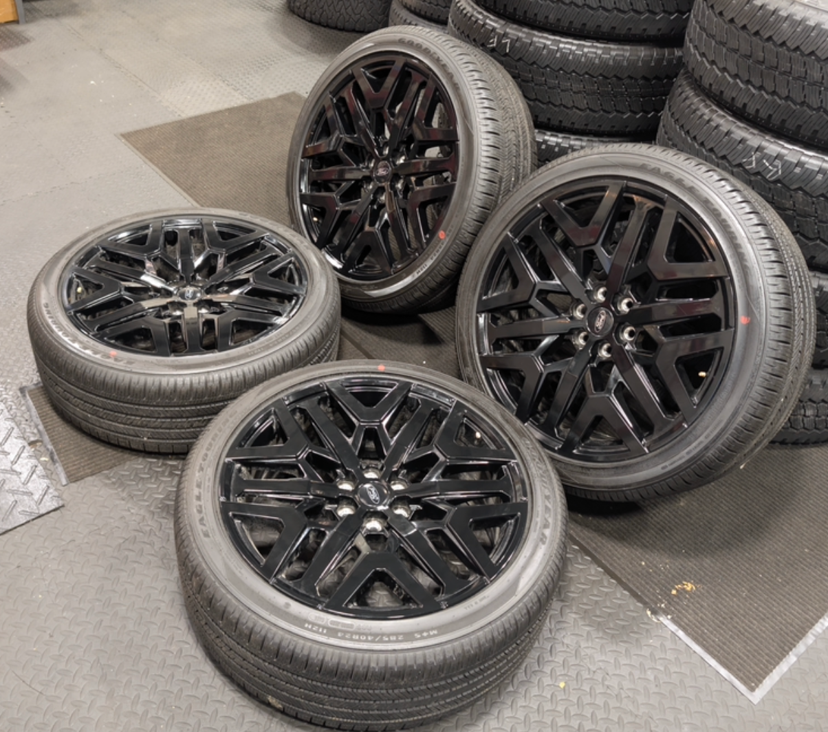 Gloss Black Ford Expedition / F-150 OEM 24” Wrapped in Goodyear Eagle Touring 285/40R24