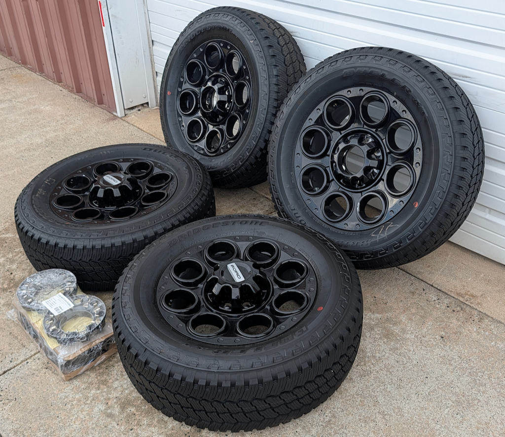 Gloss Black Ford F-250 / F-350 Super Duty Tremor OEM 20” Wrapped in Bridgestone Dueler A/T LT275/65R20
