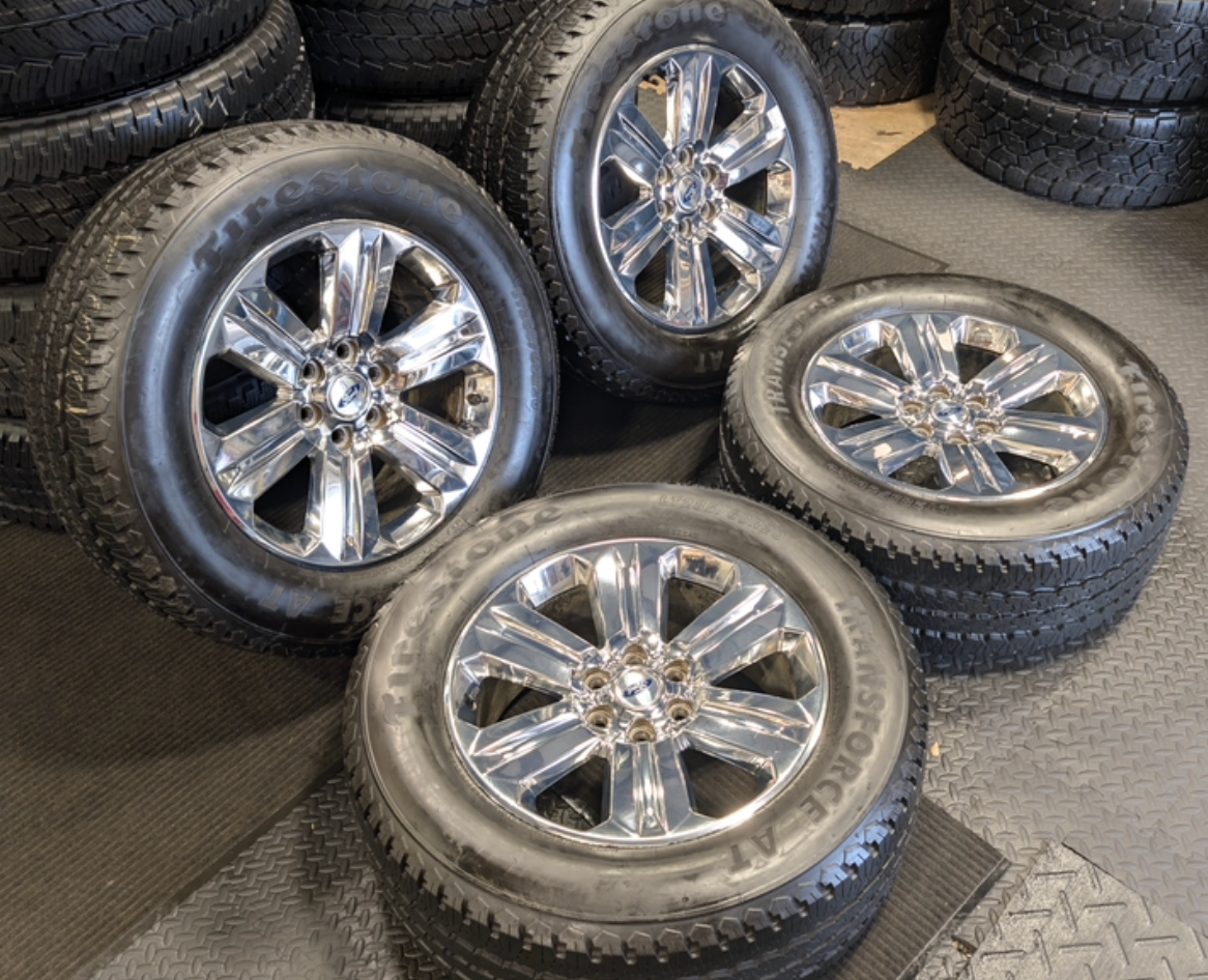 Chrome Ford F-150 OEM 20” Wrapped in Firestone Transforce A/T LT285/60R20