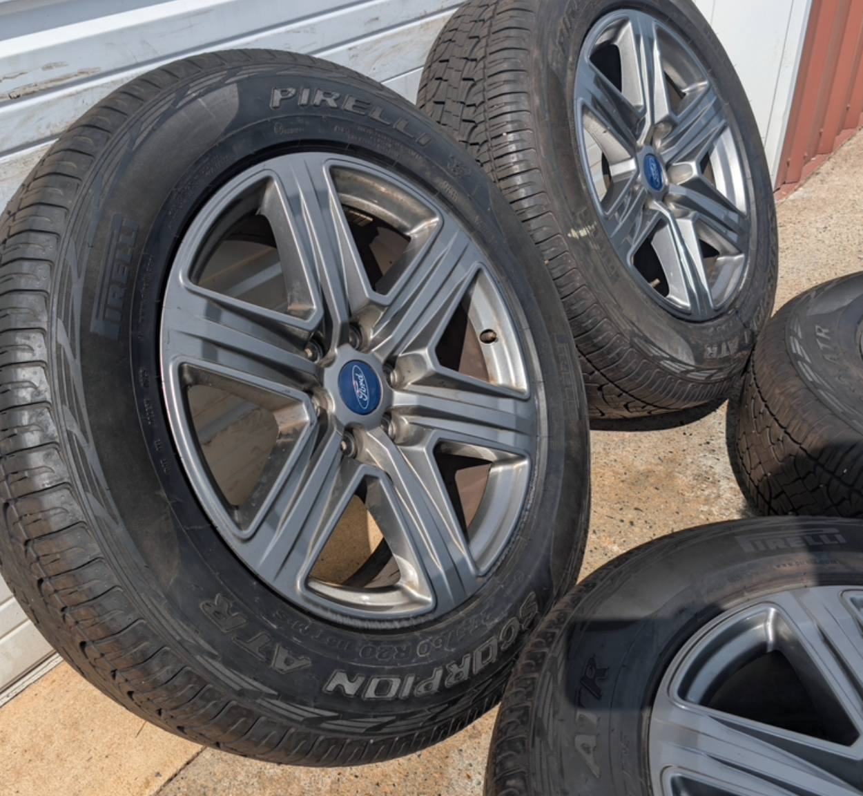 Gray Ford F-150 XLT Sport / Lariat Sport OEM 20” Wrapped in Pirelli Scorpion 275/60R20