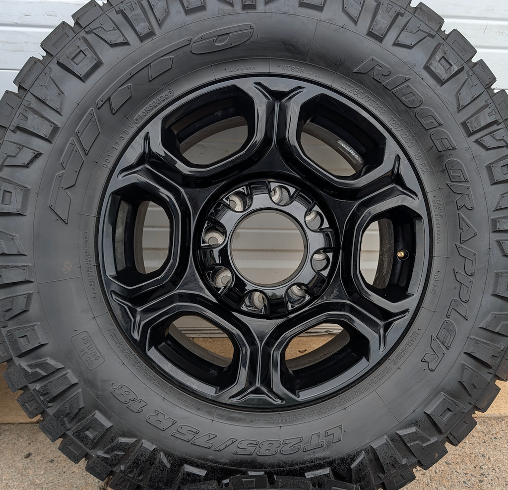 Gloss Black Ford F-250 / F-350 Super Duty OEM 18” Wrapped in Nitto Ridge Grappler LT285/75R18