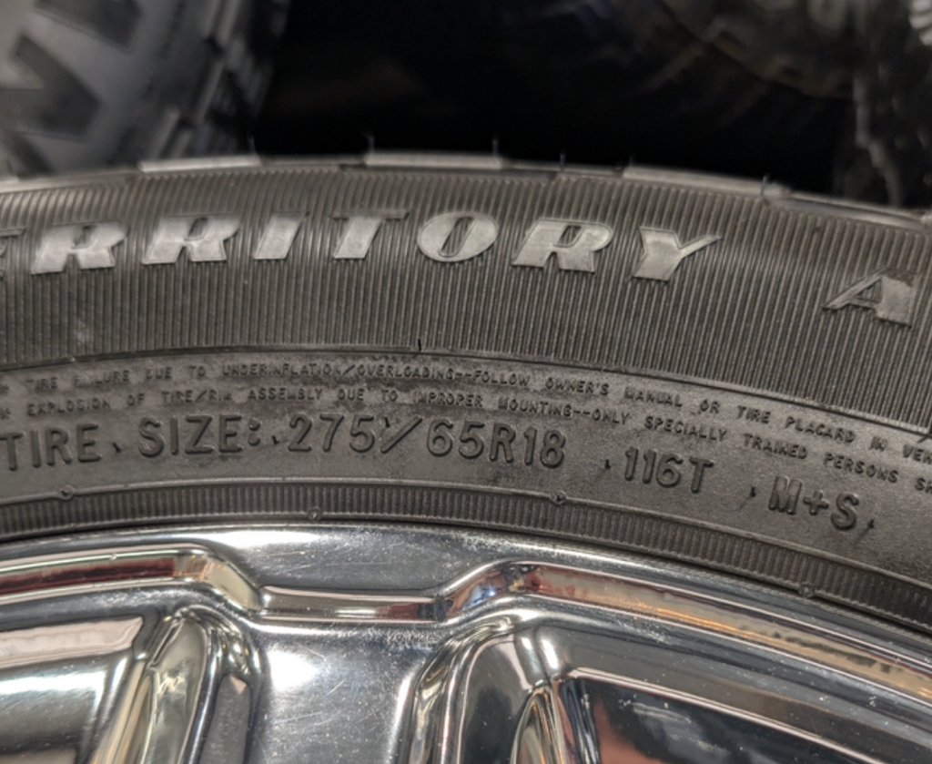 Chrome Ford F-150 OEM 18” Wrapped in Goodyear Wrangler Territory A/T 275/65R18