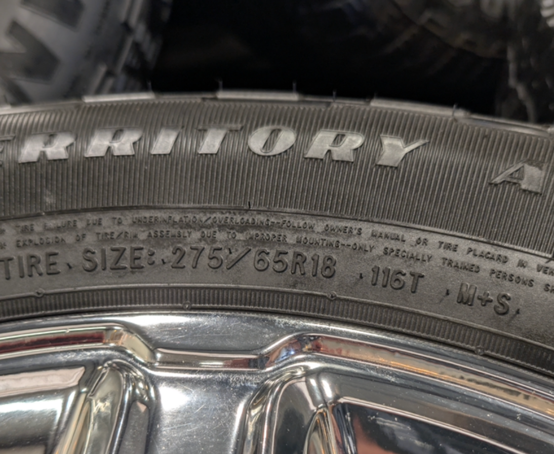 Chrome Ford F-150 OEM 18” Wrapped in Goodyear Wrangler Territory A/T 275/65R18