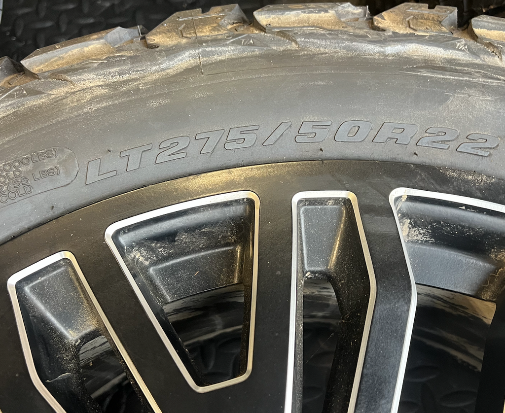 OEM 22”  Wheels wrapped in BFGoodrich All-Terrain T/A tires.