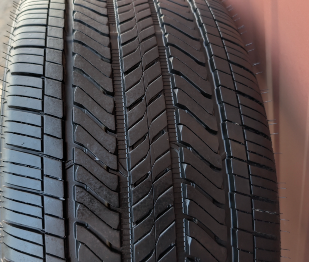 Machined GMC Yukon Denali Ultimate OEM 24” Wrapped in Bridgestone Alenza A/S 02 285/40R24