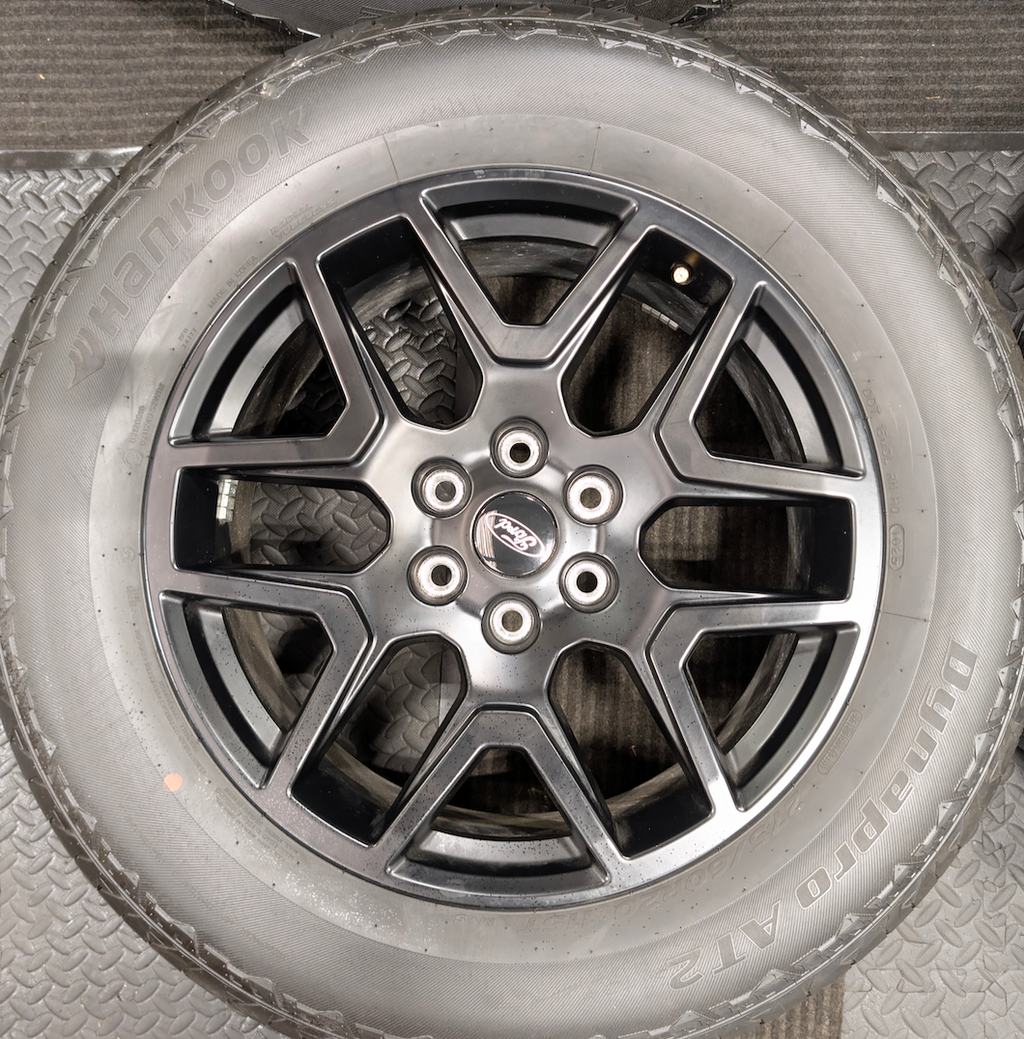 Gloss Black Ford F-150 OEM 20” Wrapped in Hankook Dynapro AT2 275/60R20