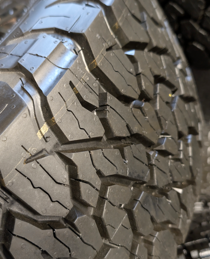 OEM 20” Black GM 2500HD / 3500HD Wheels wrapped in LT275/65R20 BFGoodrich All-Terrain T/A tires.