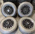 OEM 18” Chevrolet Silverado ZR2 2500HD / 3500HD Gloss Black Wheels wrapped in Toyo Open Country A/T tires.
