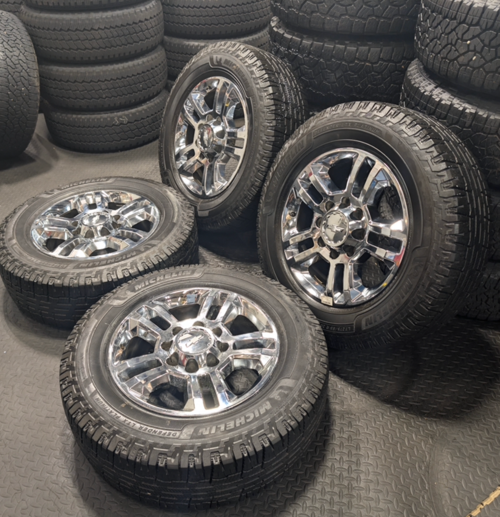 Chrome GM 2500HD / 3500HD OEM 20” Wrapped in Michelin Defender LTX