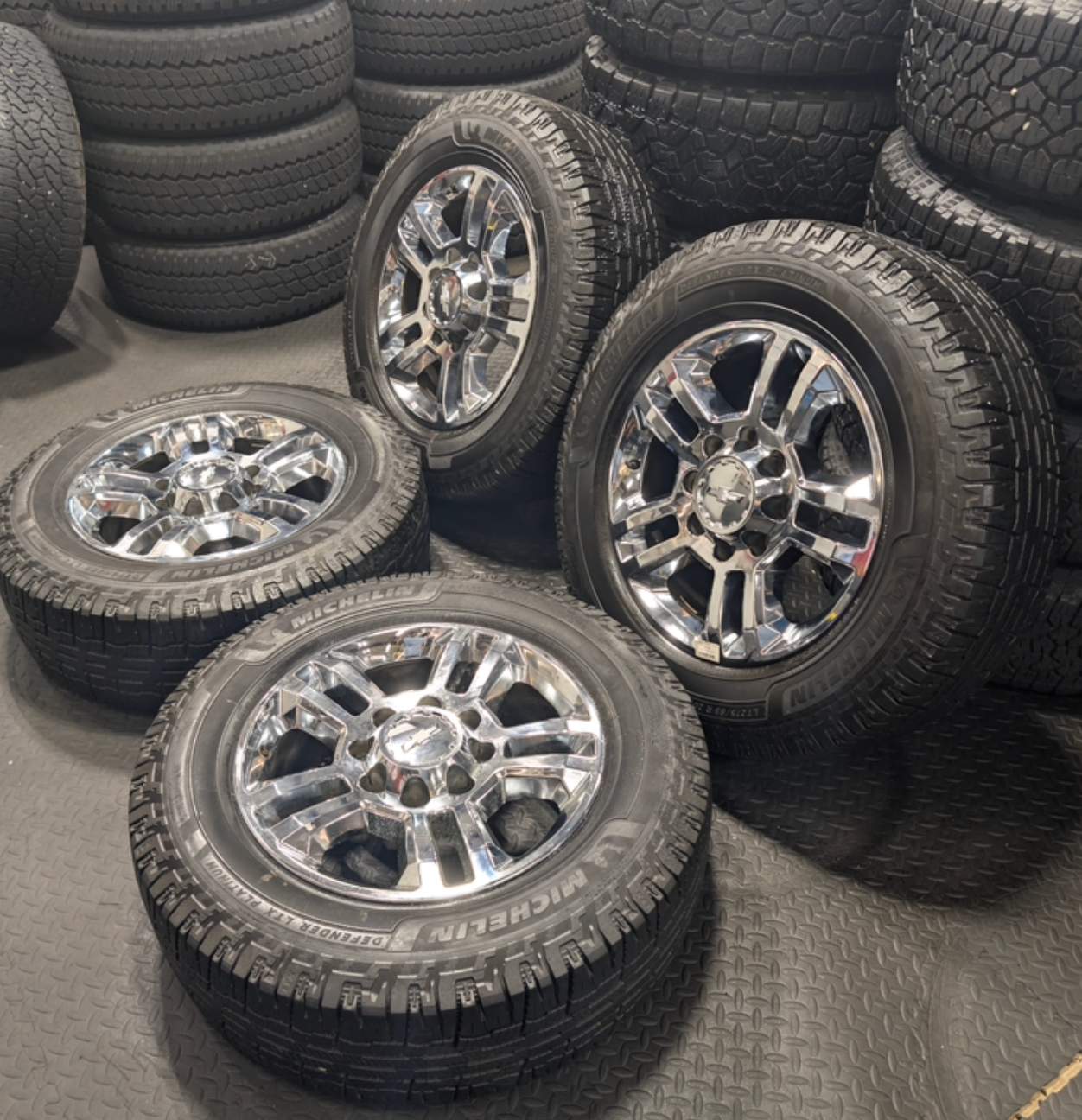 Chrome GM 2500HD / 3500HD OEM 20” Wrapped in Michelin Defender LTX
