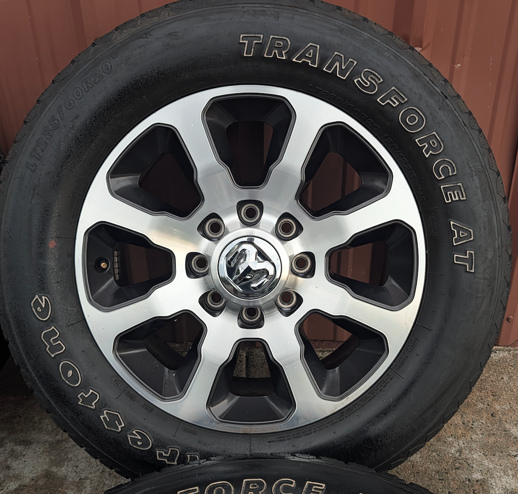 Machined 2500 / 3500 Laramie Longhorn OEM 20” Wrapped in Firestone Transforce A/T LT285/60R20