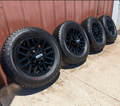 OEM 20” Chevrolet Silverado RST Gunmetal & Machined Wheels wrapped in Goodyear Wrangler TrailRunner A/T tires.