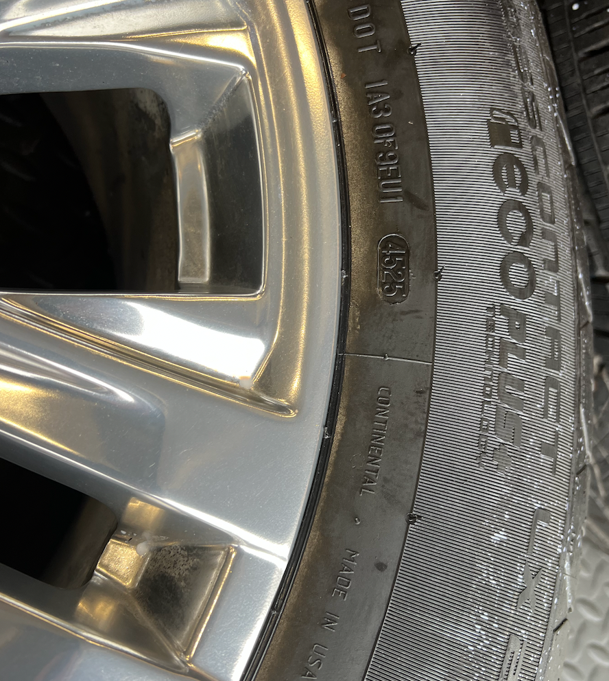 OEM 20” Polished Wheels wrapped in 20” Continental tires.